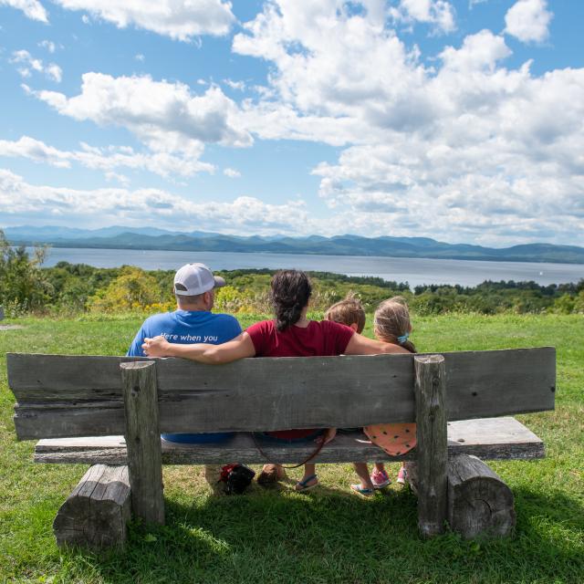 A family looking at the view from Lone Tree Hill