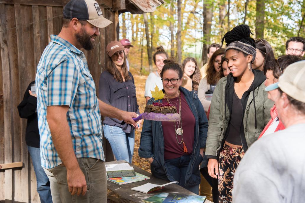 Program participants learn how to make mud pie.