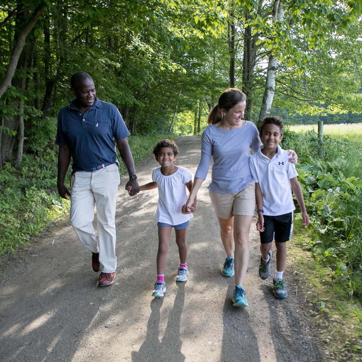 Family walking on trail