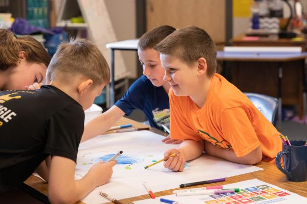 Willston Central School students working on a community map inspired by the UN's Sustainable Development Goals.