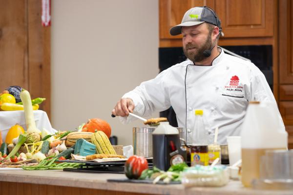 Executive Chef Emeritus Jim McCarthy leads a cooking demonstration during the Champlain Valley Fair.