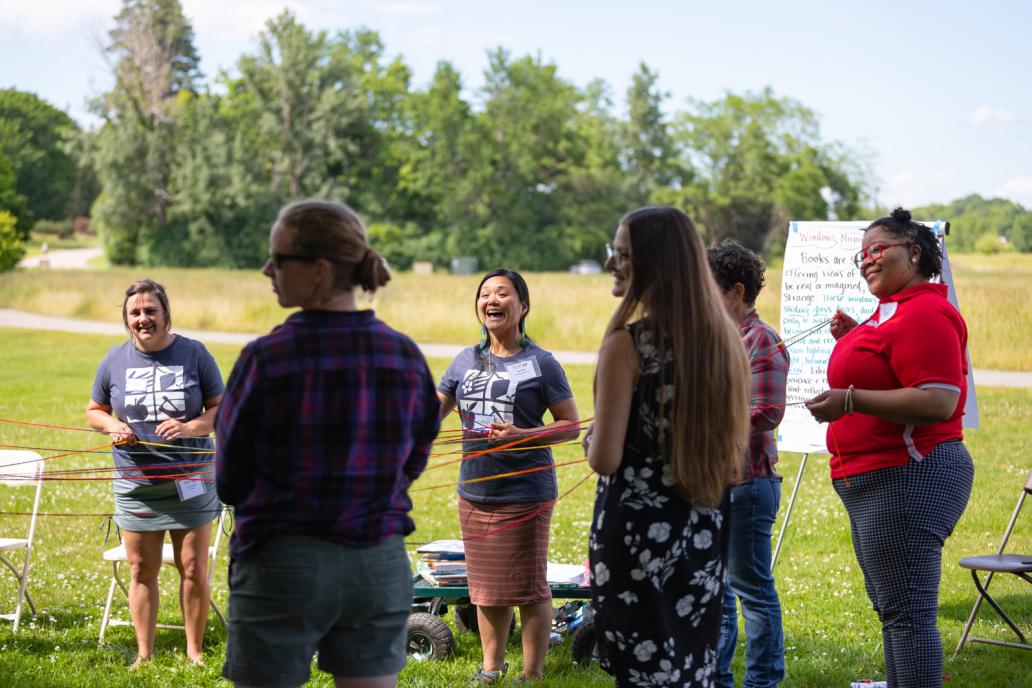 Participants explore "Farm to School in the Classroom with an Equity Lens" as they build a 3D food web mapping the journey of food to cafeteria.