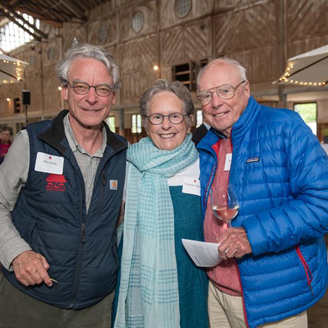 People enjoying the Stewards Reception in the Breeding Barn