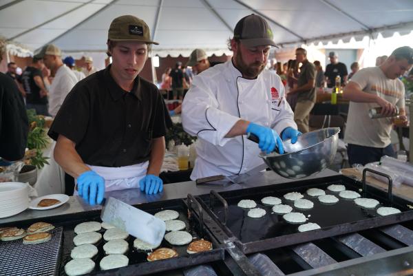 Chef Emeritus Jim McCarthy cooking at the VFN Forum Dinner. Photo courtesy Vermont Fresh Network & Local Frame Media.